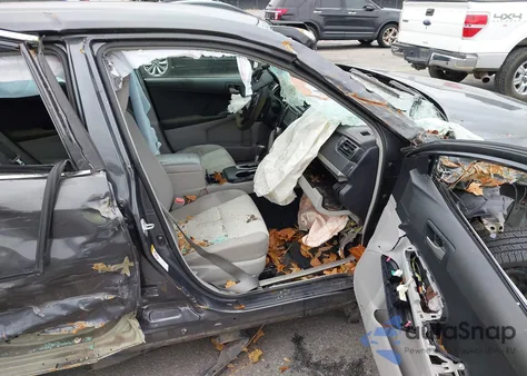 2012 Toyota Camry Le z USA, uszkodzony, nr VIN 4T1BF1FK7CU092433